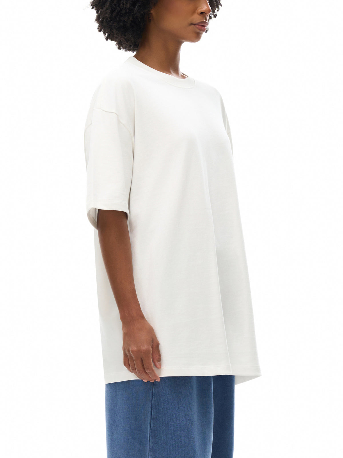 Unisex heavyweight Earth Tone T-shirt in White – side model view
