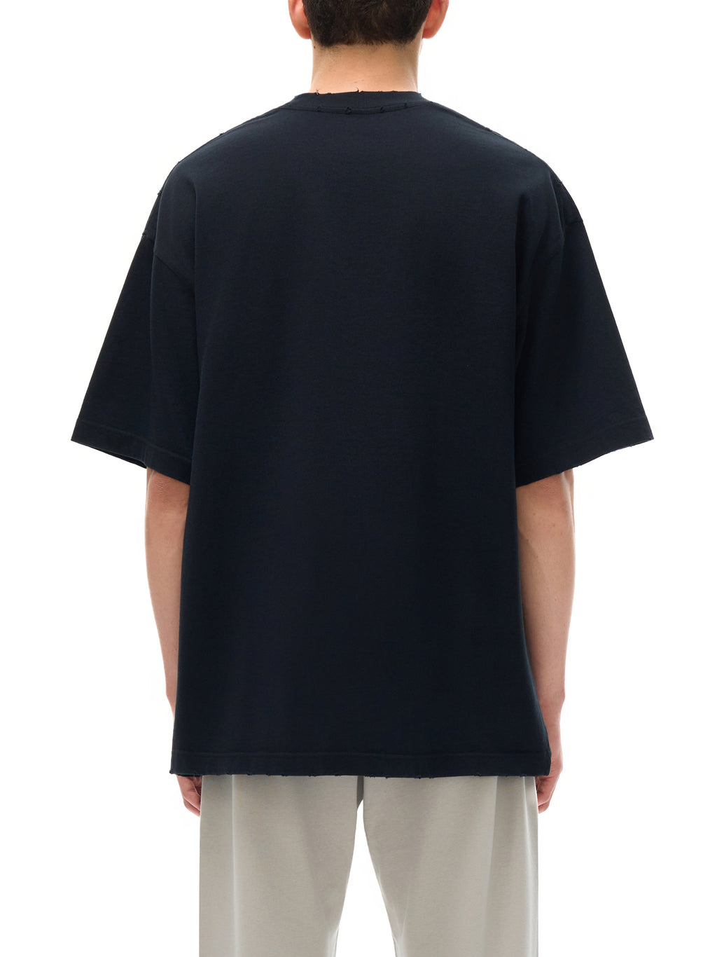 Unisex heavyweight hand-frayed T-shirt in Black – back model view
