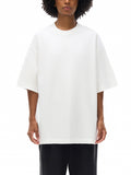 Unisex heavyweight hand-frayed T-shirt in White – front model view