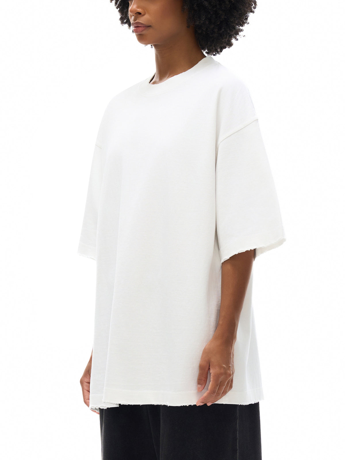 Unisex heavyweight hand-frayed T-shirt in White – side model view