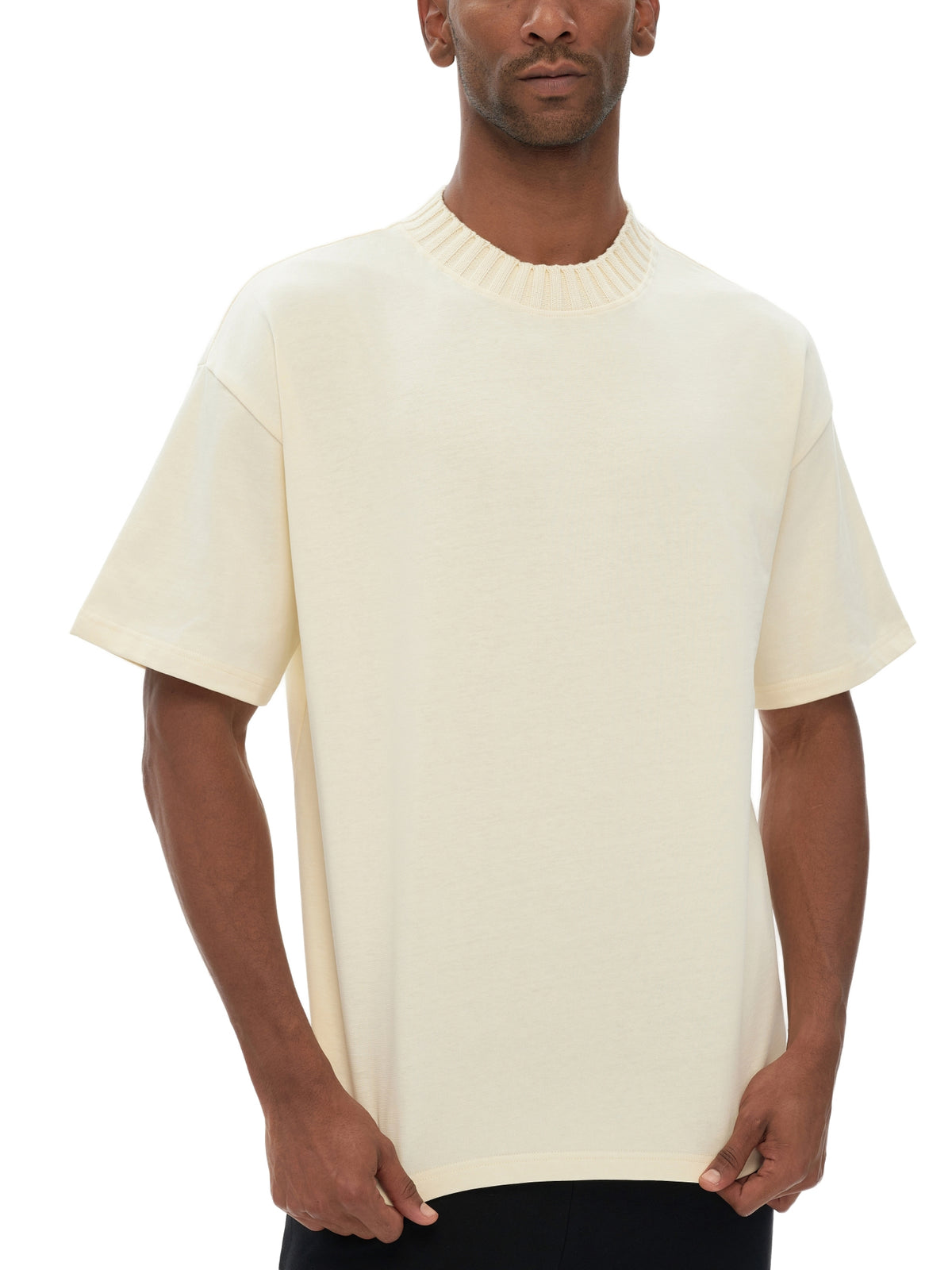 Unisex heavyweight knitted crewneck T-shirt in Apricot – front fit view