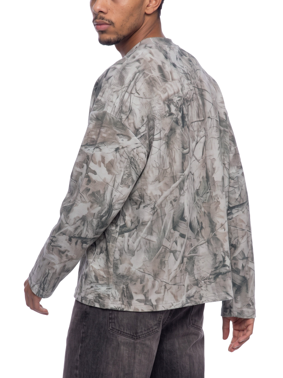 Unisex Tree Camo Waffle T-Shirt on male model angle view