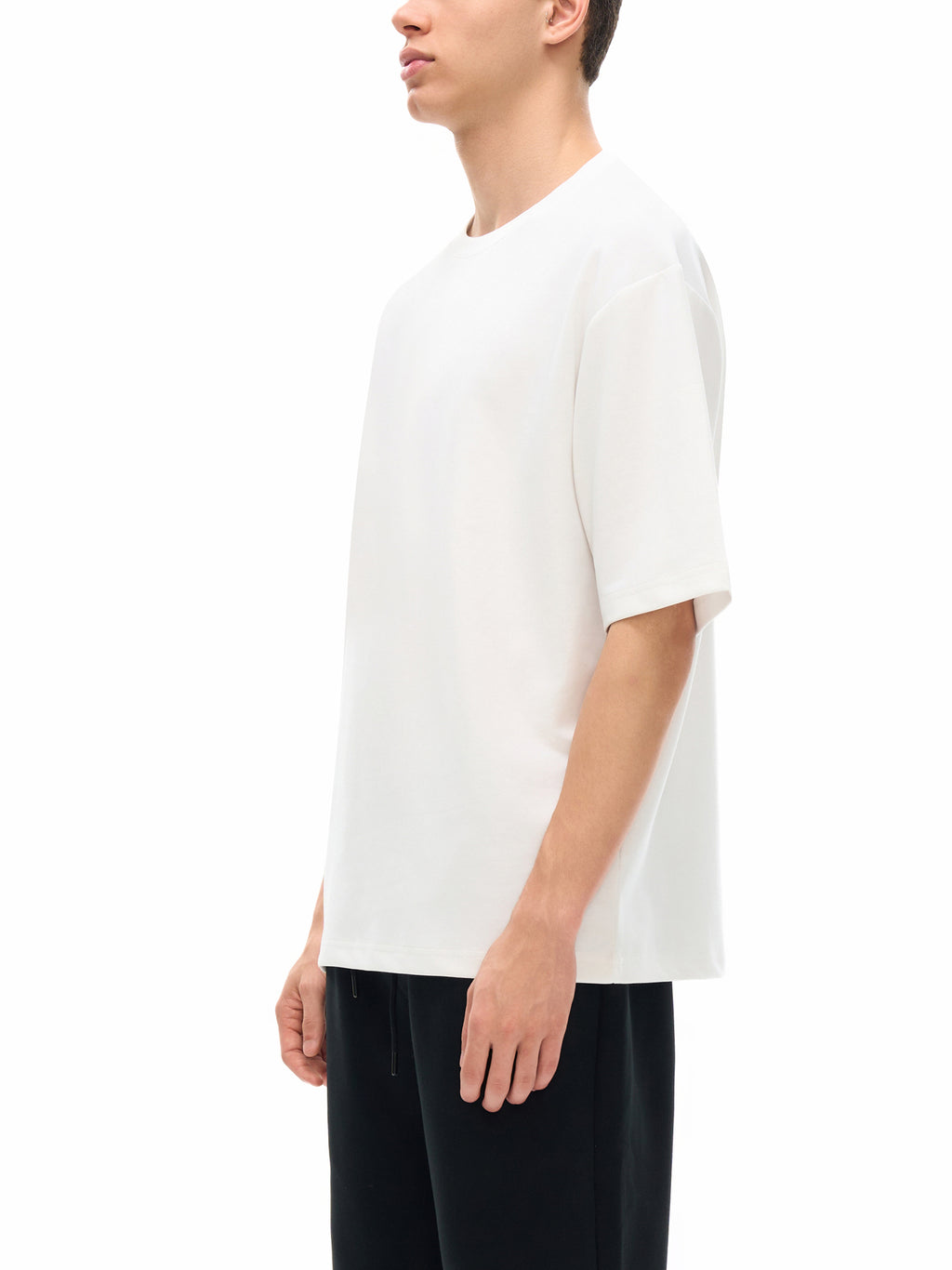 White Essential Cooling Performance T-Shirt on model side view