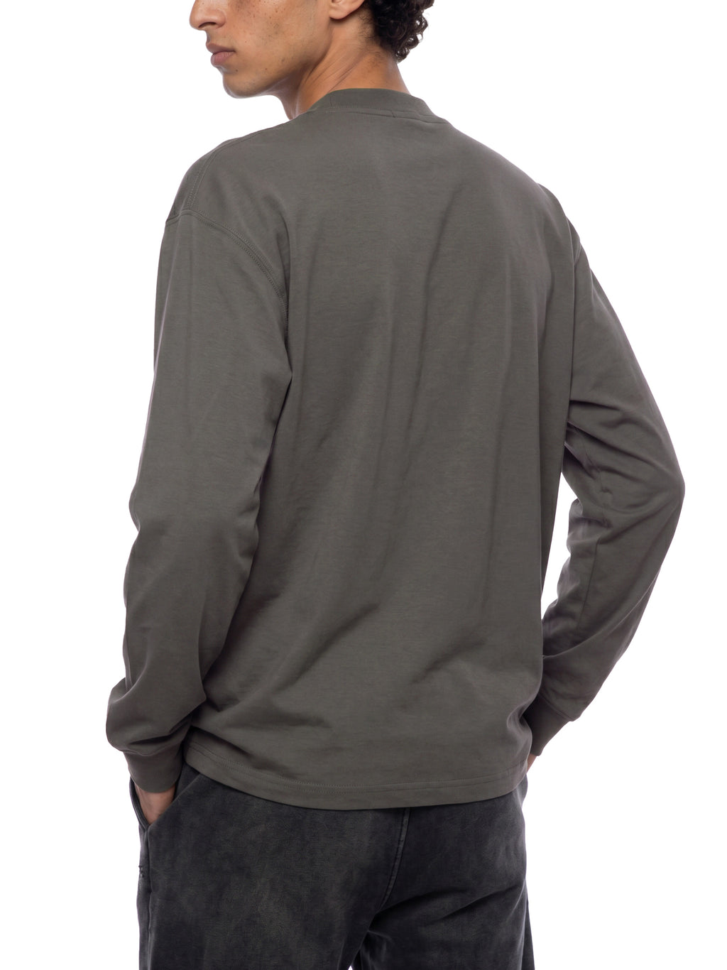 Off Script Essential Crewneck Long-Sleeve T-Shirt on male model back three-quarter view
