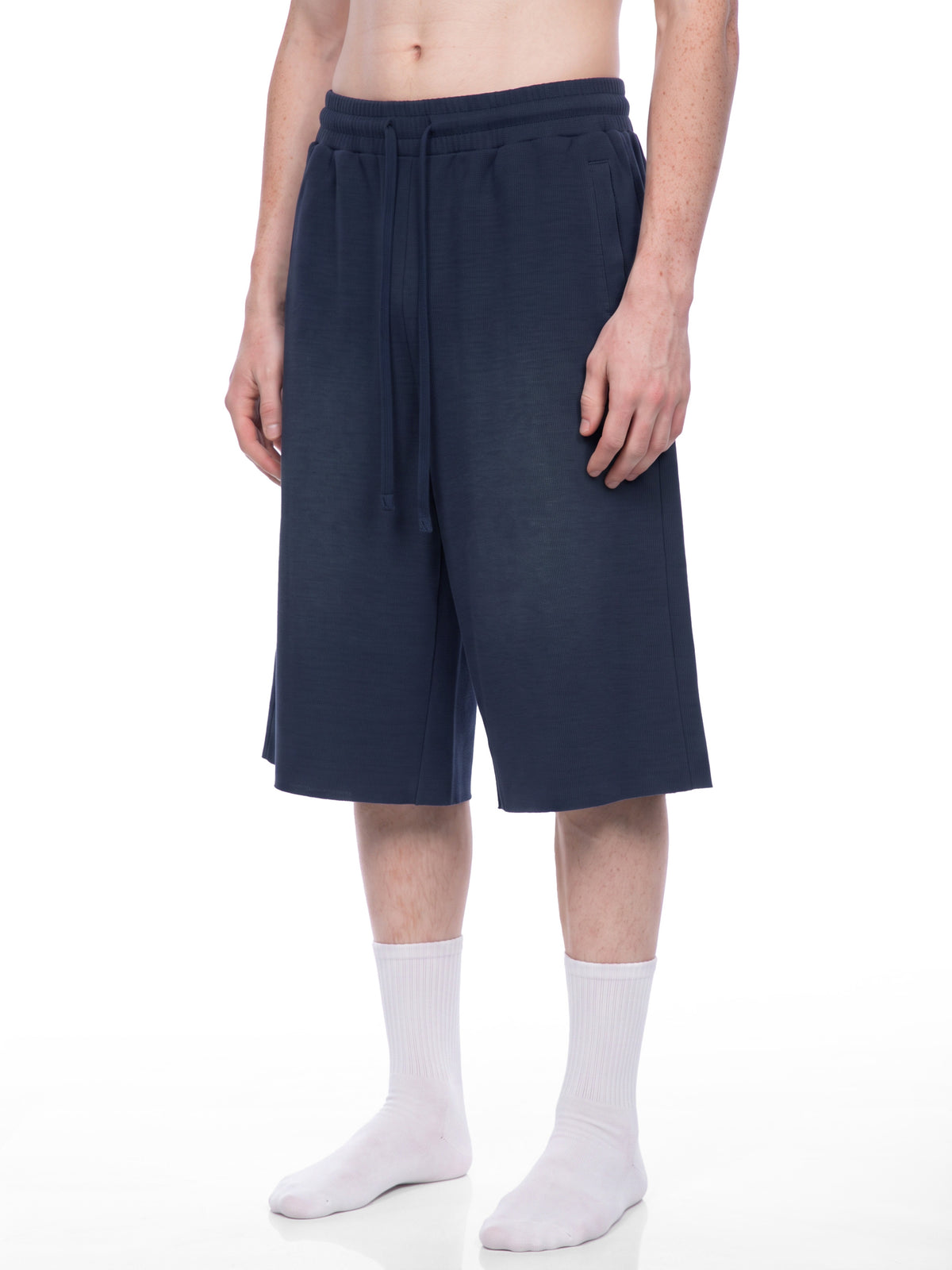 Off Script Unisex Sunfade Raw Edge Shorts model three-quarter view