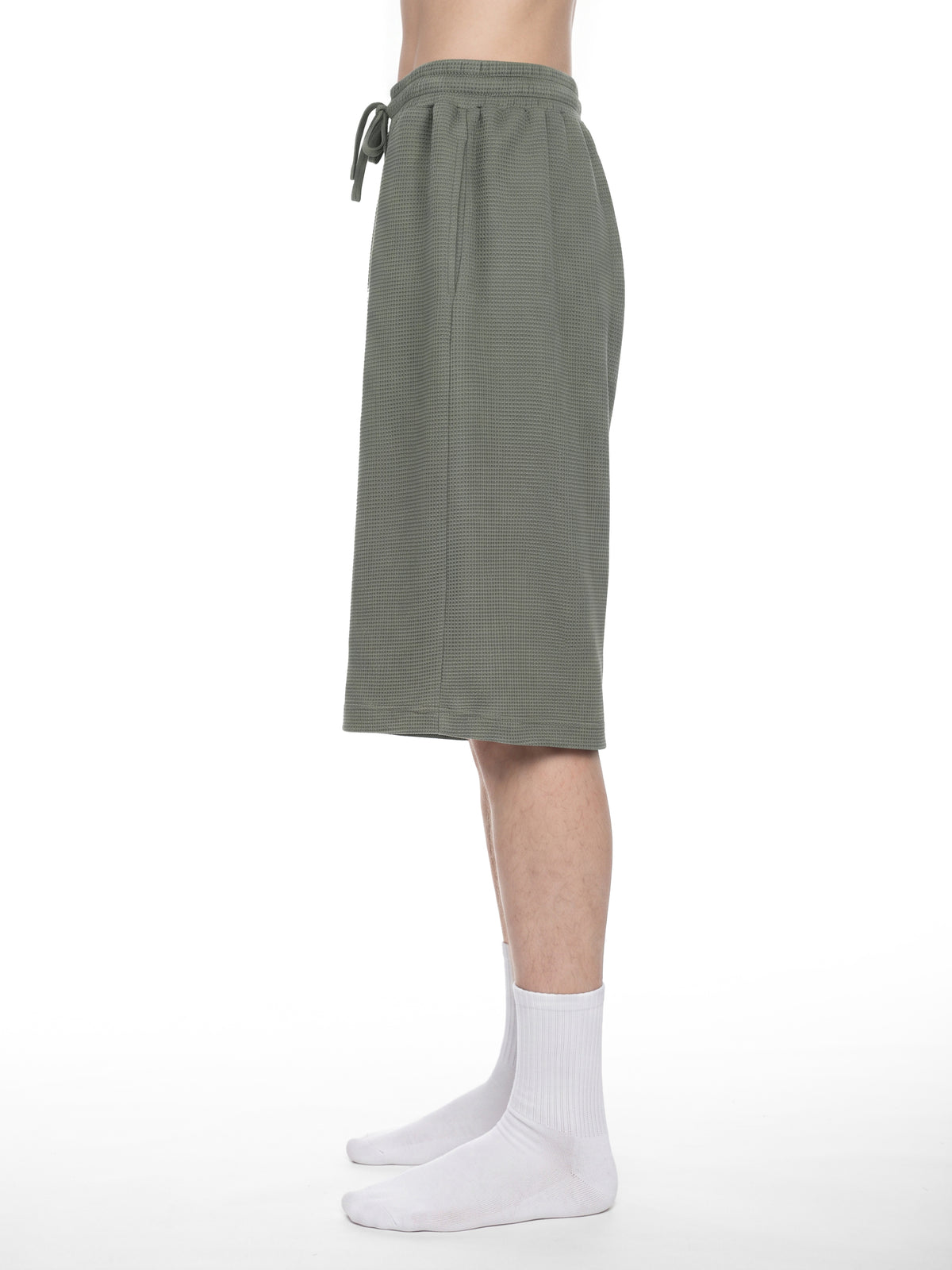 Off Script Unisex Waffle Shorts model side view