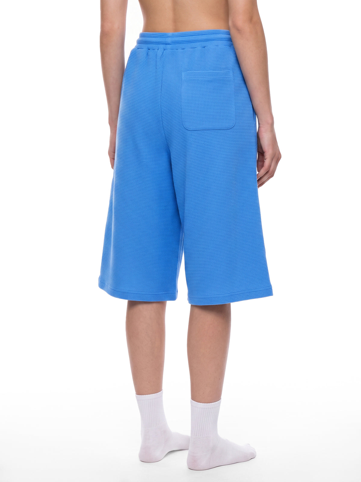 Off Script Unisex Waffle Shorts Colourful Blue model rear three-quarter view