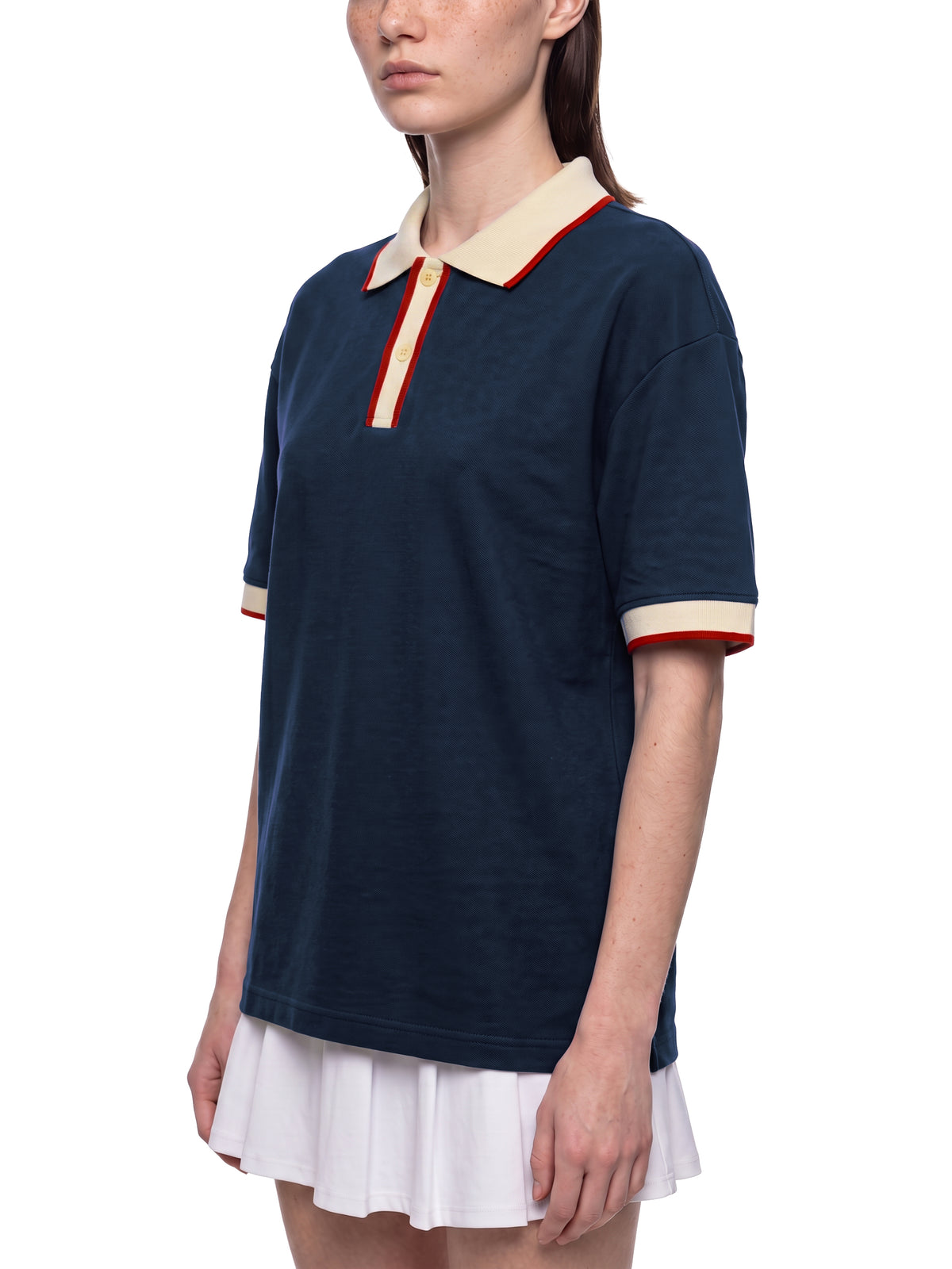 Off Script Unisex Color Block Polo Shirt on female model front three-quarter view