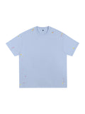 Paint Splatter T-Shirt – Light Blue front view