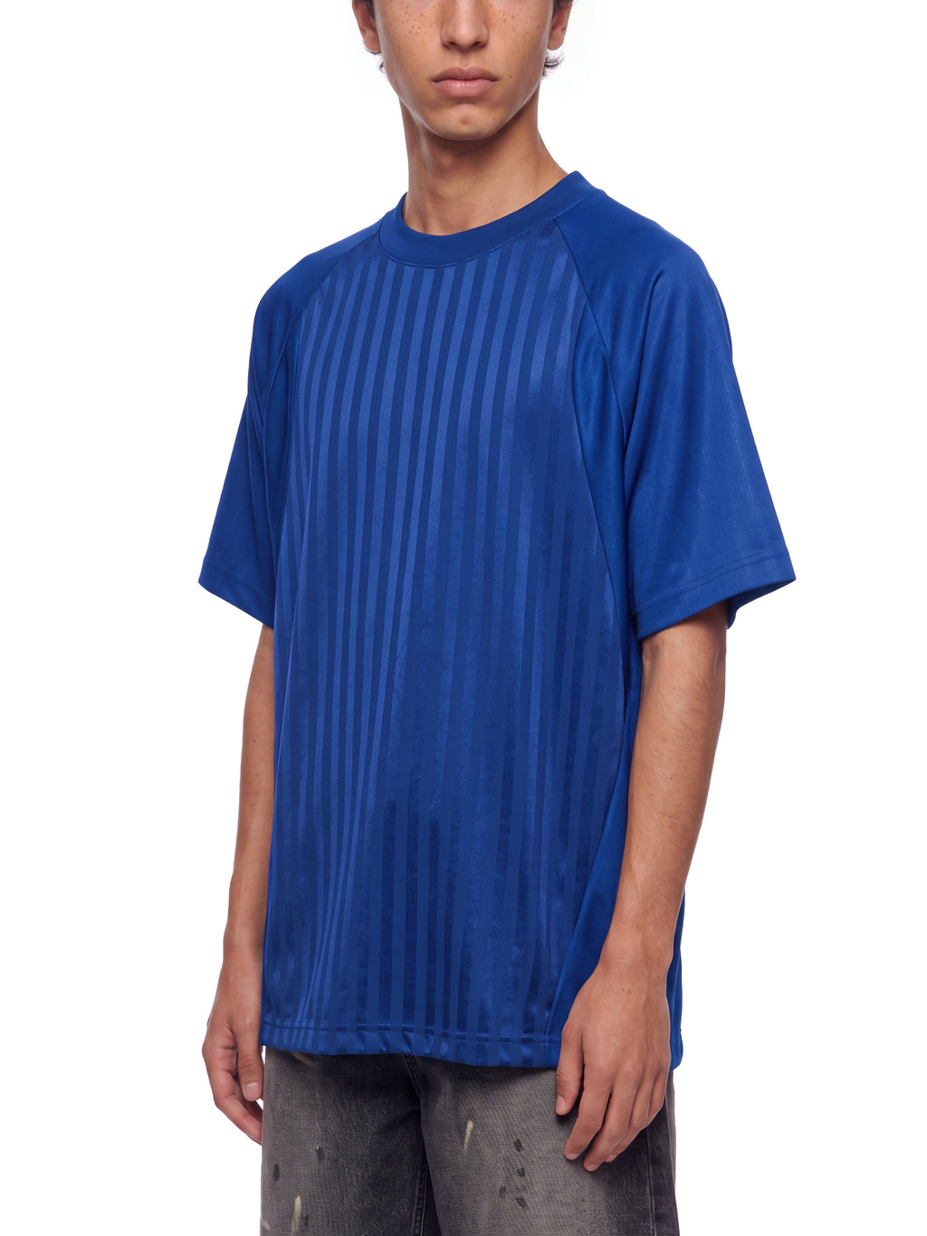 Unisex Striped Soccer Jersey royal blue model angled view