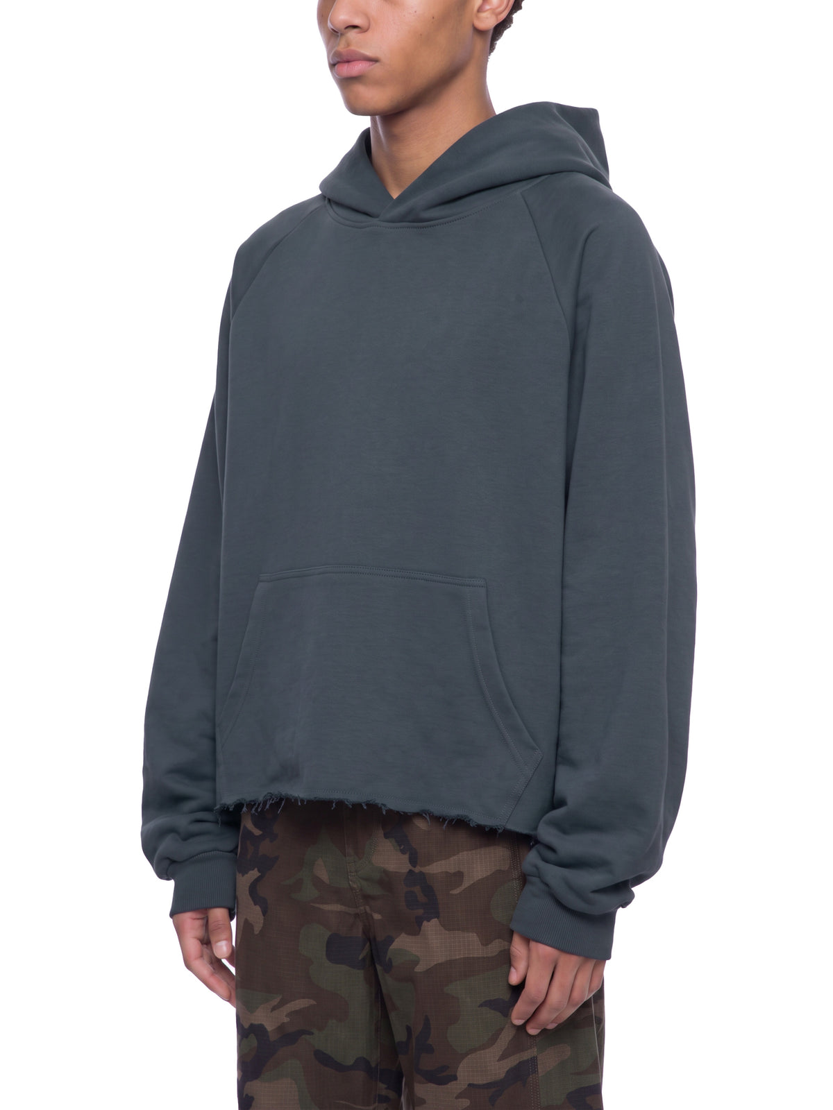 Unisex Vintage Wash Raw Edge Boxy Hoodie blue model three-quarter view