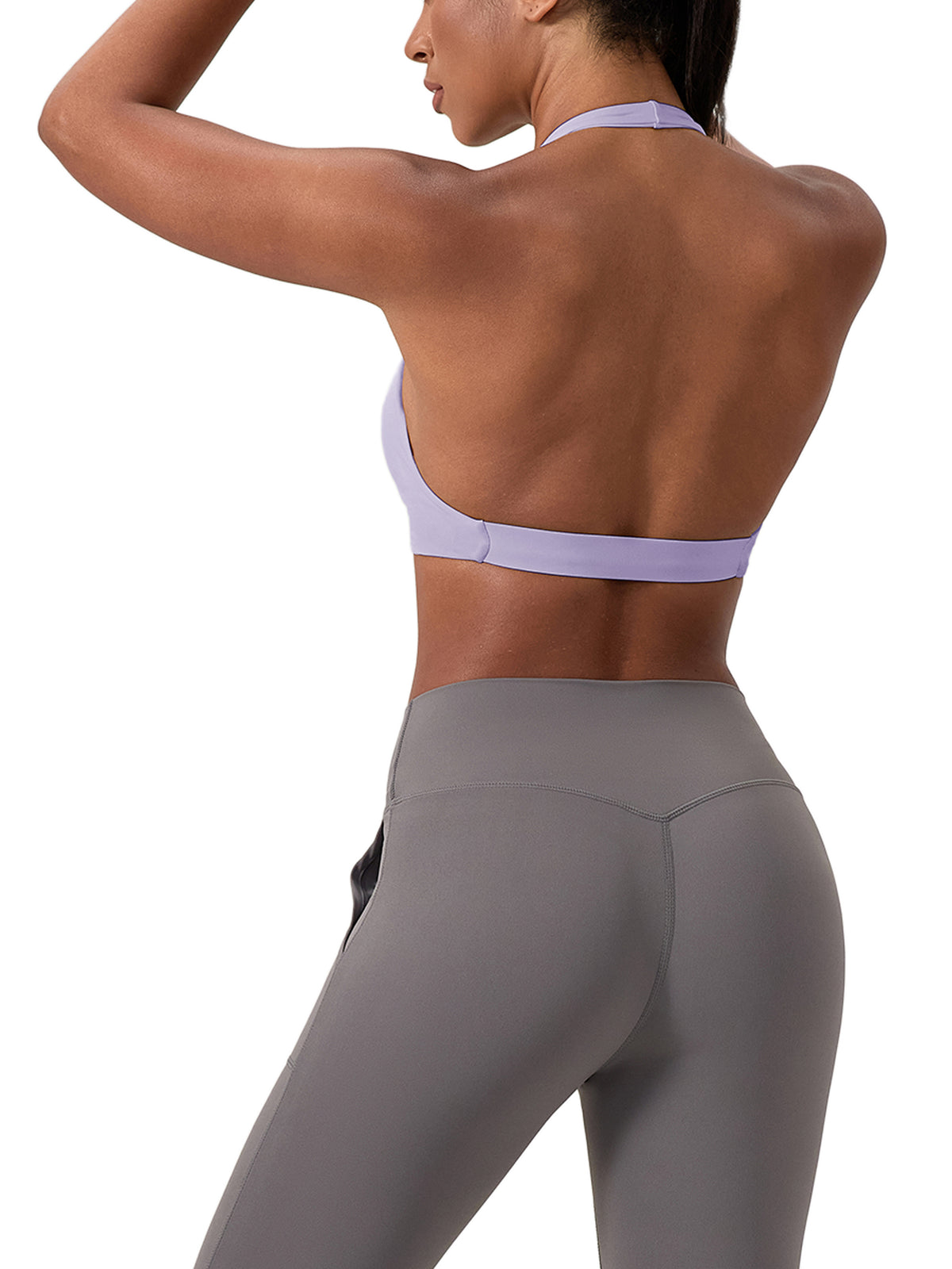 Woman modelling Women's Pleated Halter Sports Bra - rear angled view